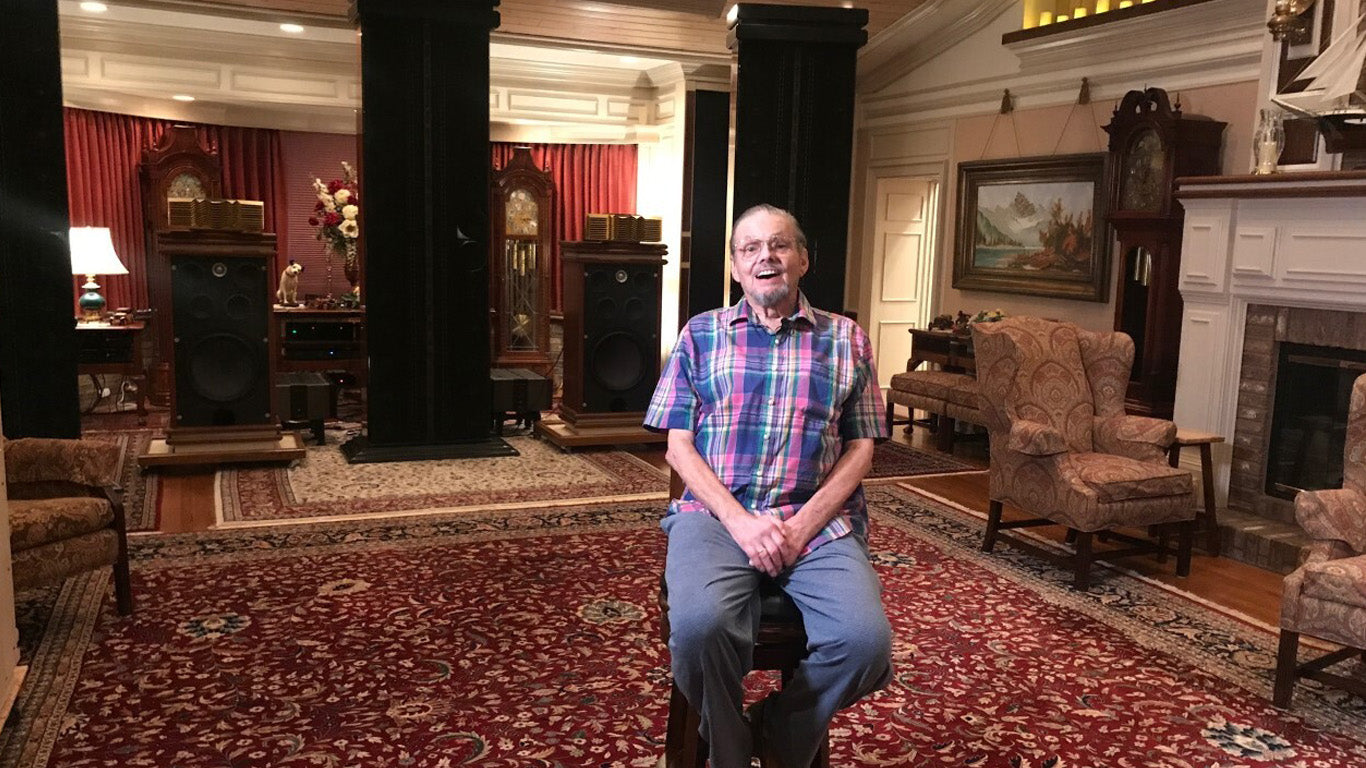 Ken Fritz seated in front of his hi-fi stereo setup in his room