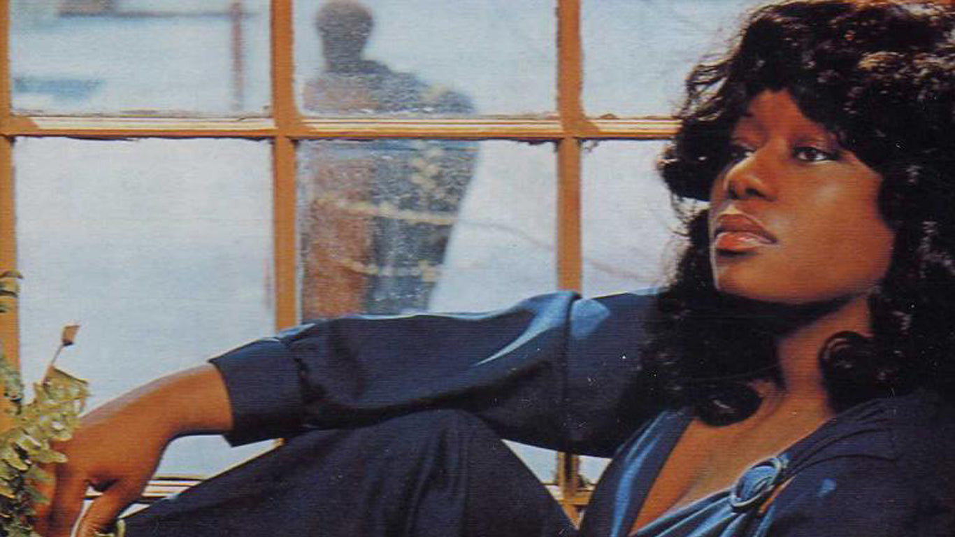 Loleatta Holloway sitting by window