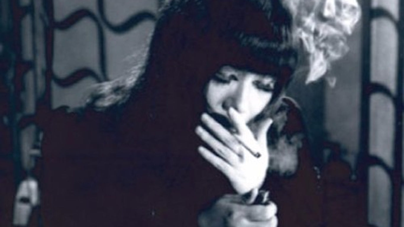 Maki Akasaw smoking a cigarette