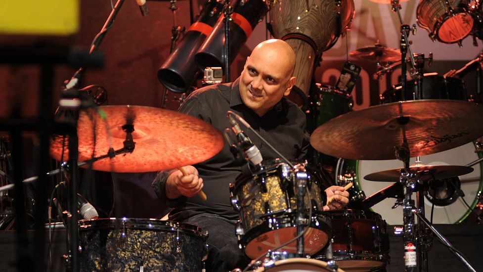 Adrian D'souza playing the drums