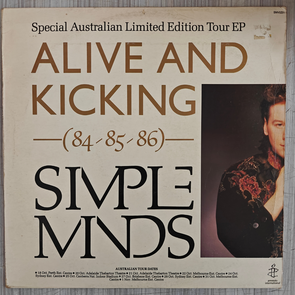 simple-minds-alive-and-kicking--(84/85/86)--vinyl-record.jpg