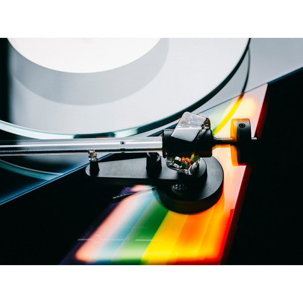 Close-up of the tonearm on the Pro-Ject Dark Side of the Moon Special Edition Turntable illustrating advanced audio components